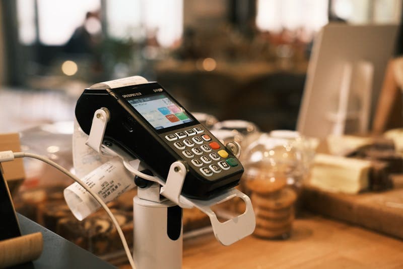 Modern payment terminal and POS system on a counter